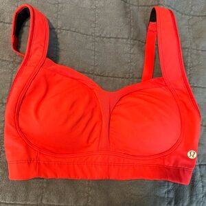 Lululemon sports bra. 32D. Never worn. No tags. Red.